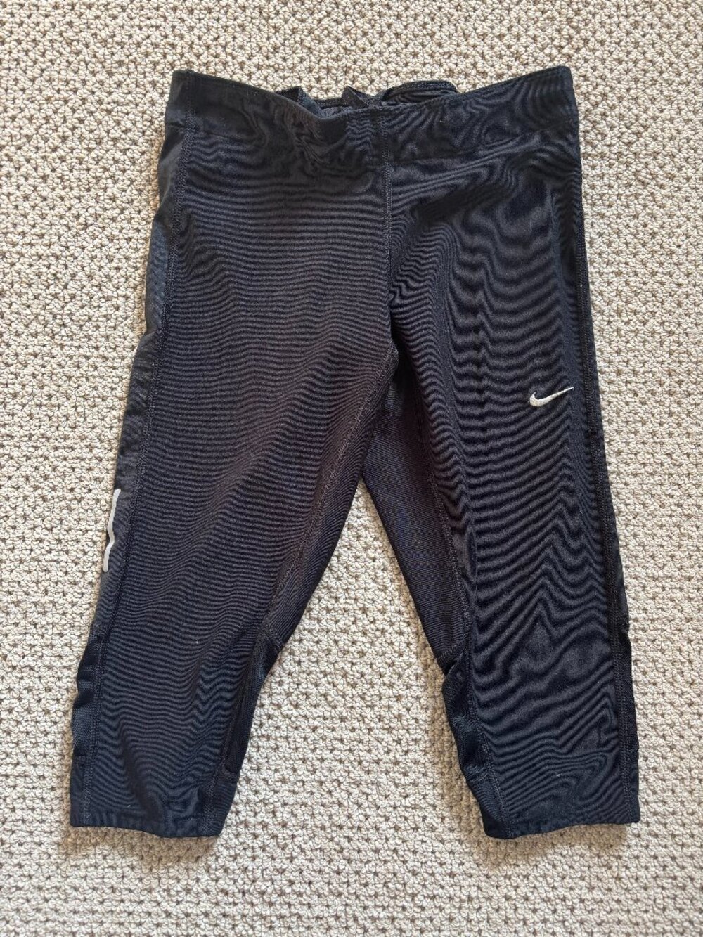 Nike Dri-FIT Women's running tights, featuring mesh panels